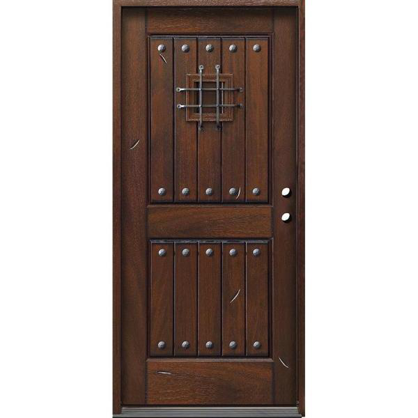 Wooden door with decorative iron grille on a white background