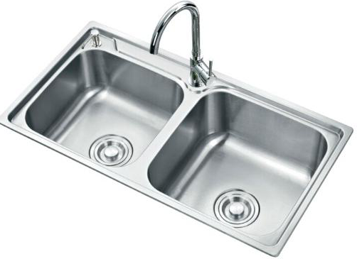 Stainless steel kitchen sink on a white background